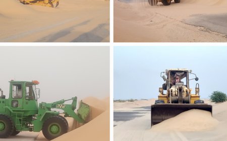 أعمال إزالة الرمال الزاحفة تتواصل في منطقتي النشيمة وعرقة رغم اشتداد الرياح الموسمية