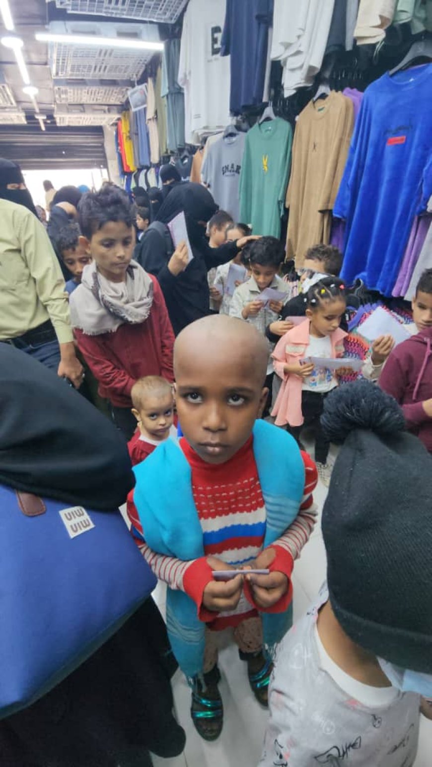 محل ملابس تايفون ورفلي توزع كسوة عيد لـ60 طفل من ذوي الهمم ومرضى السرطان